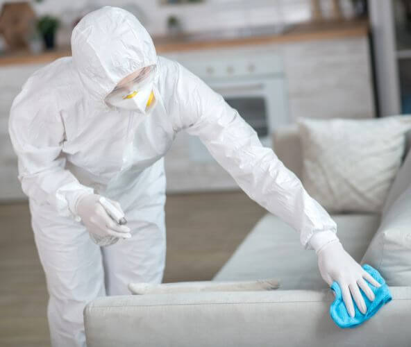 Specialist cleaning up blood in an Huntington Beach, CA home