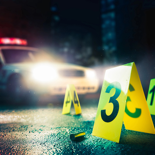 police car at crime scene cleanup after murder