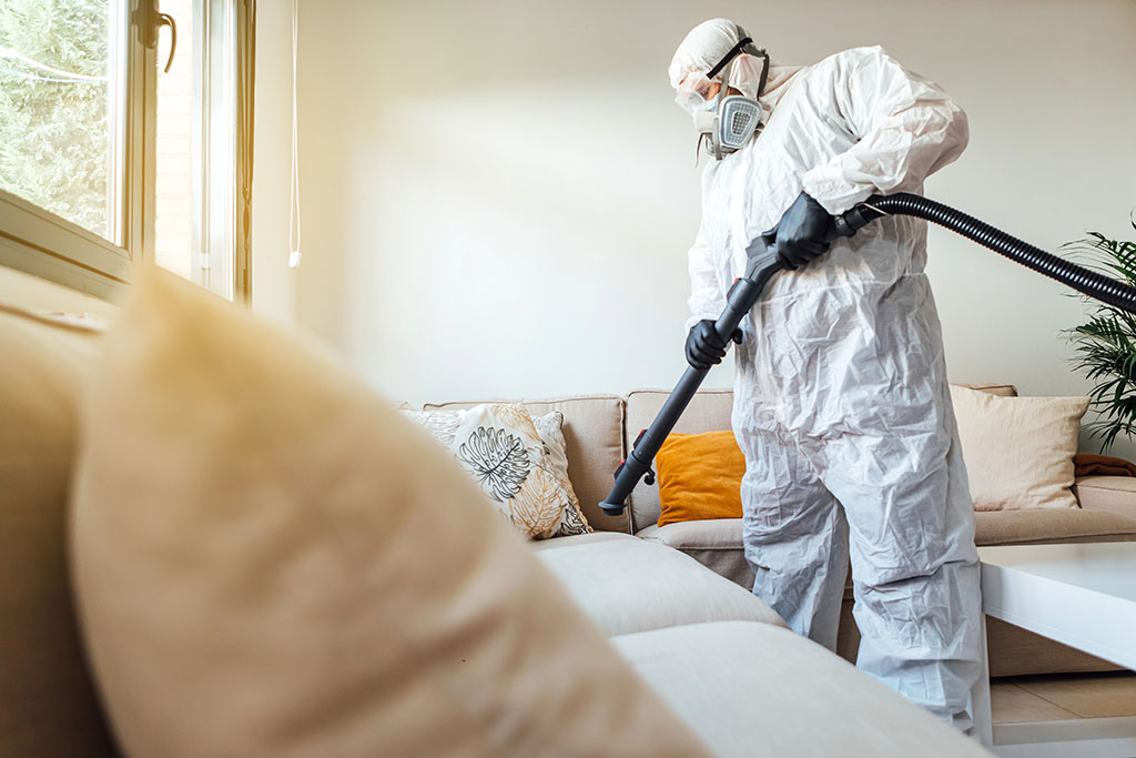 A man in PPE doing unattended death cleanup in Hollywood