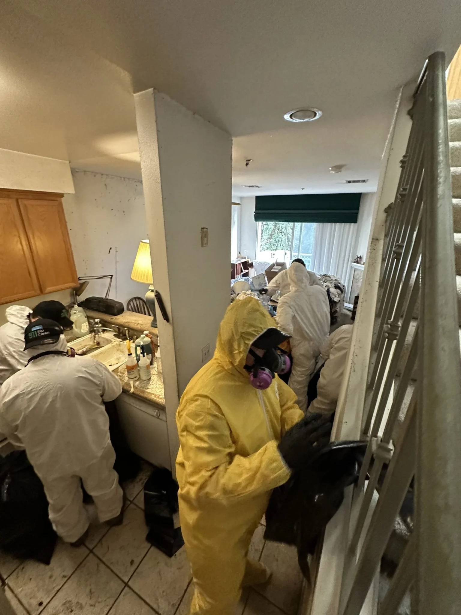 Hoarding Cleanup Crew Cleaning Kitchen in Los Angeles, CA